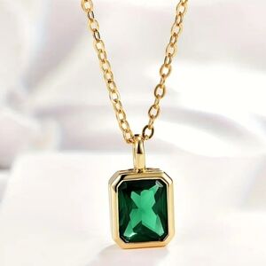 18 kt Gold over Titanium necklace with emerald